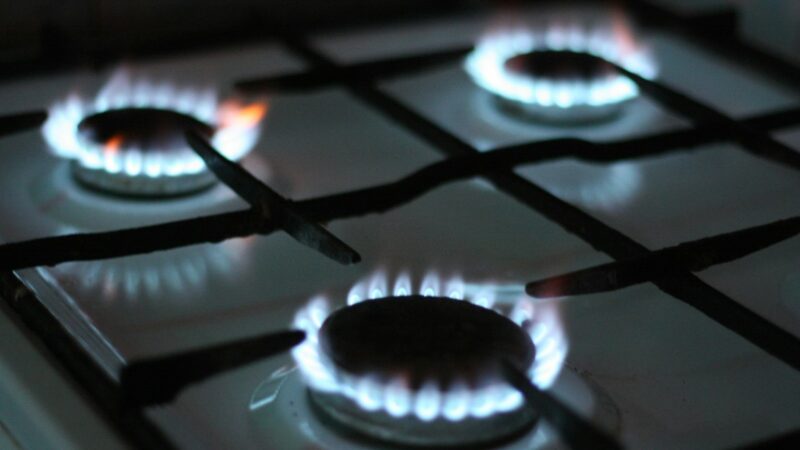 black gas stove with white and black gas stove
